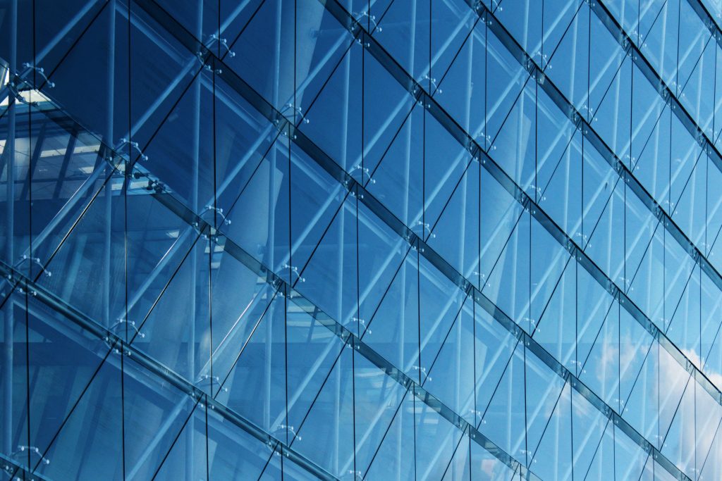 glass facade of the building which reflects the b 2026 01 08 06 45 59 utc